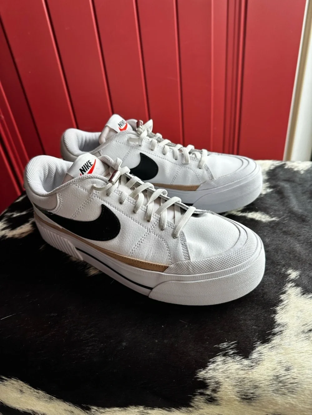 Nike White Low-Top Sneakers with Black Swoosh and Gold Trim - Picture 3 of 7